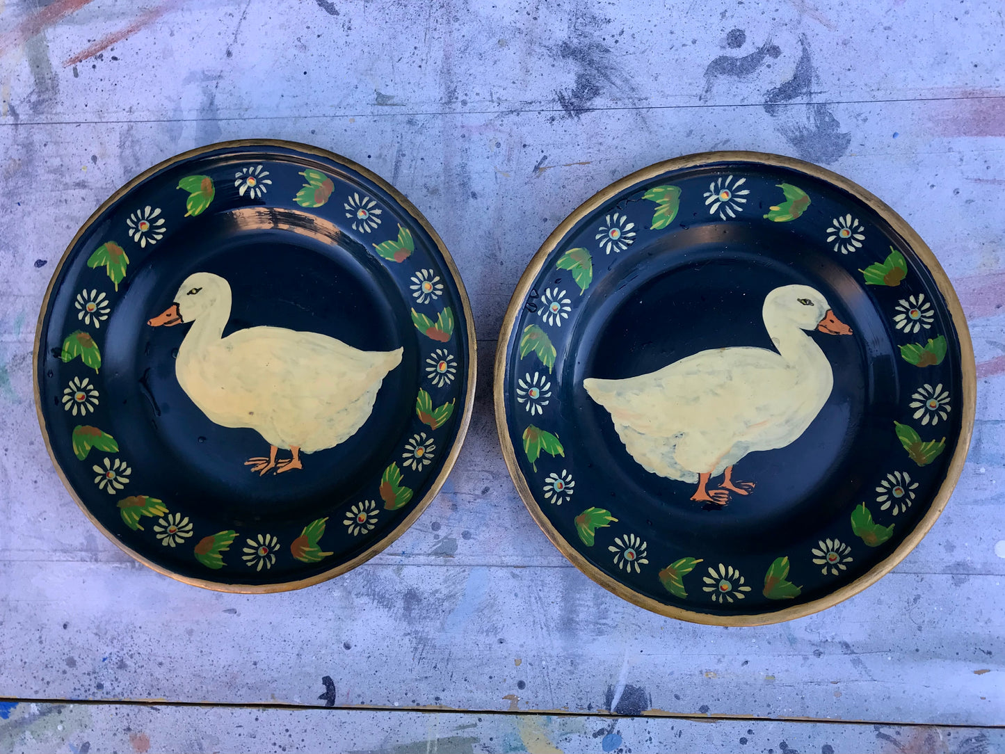 Hand painted vintage metal duck plates