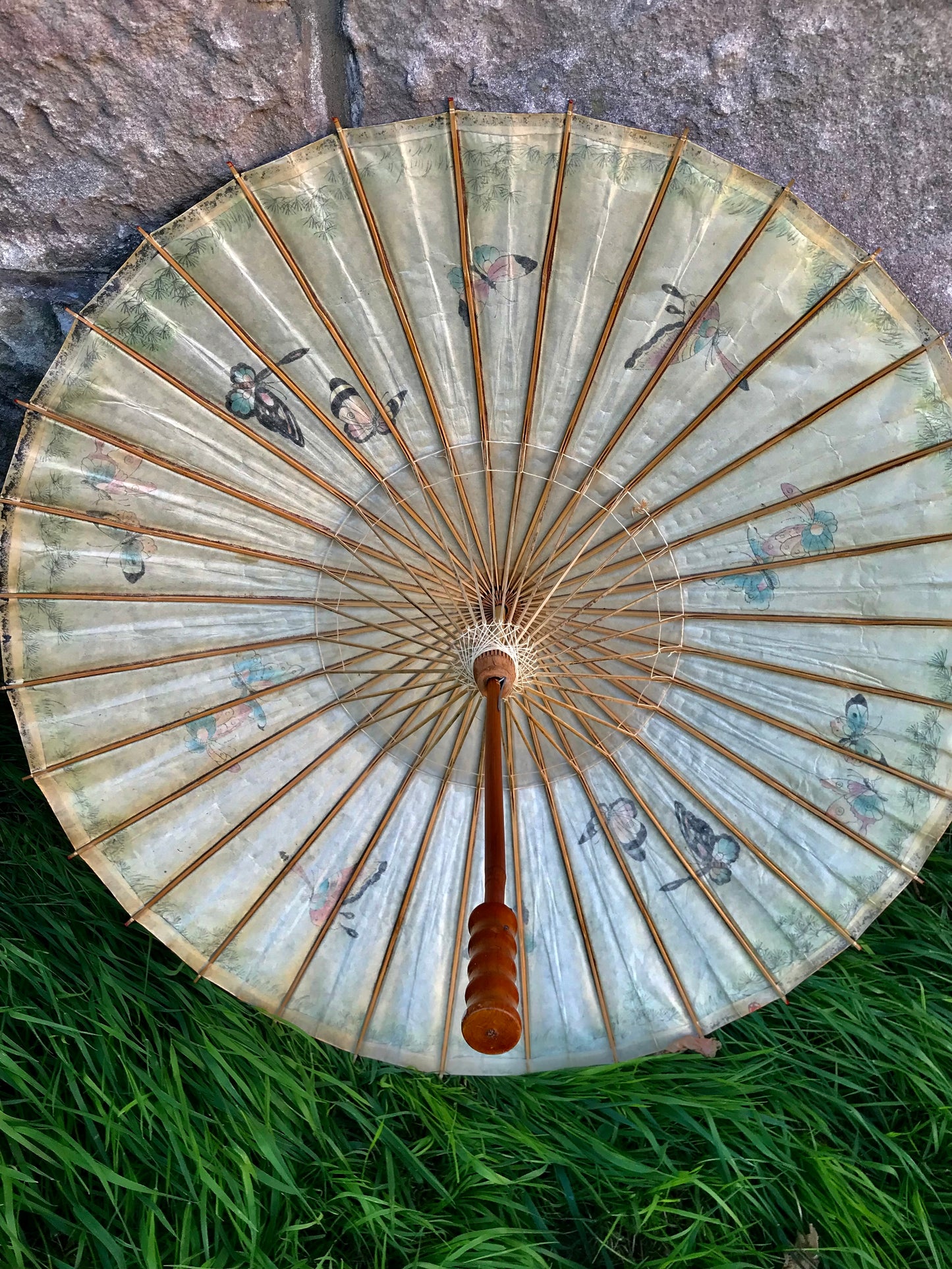 Vintage wax paper Japanese parasol covered in gorgeous butterflies 55cm long x 79cm wide when open.