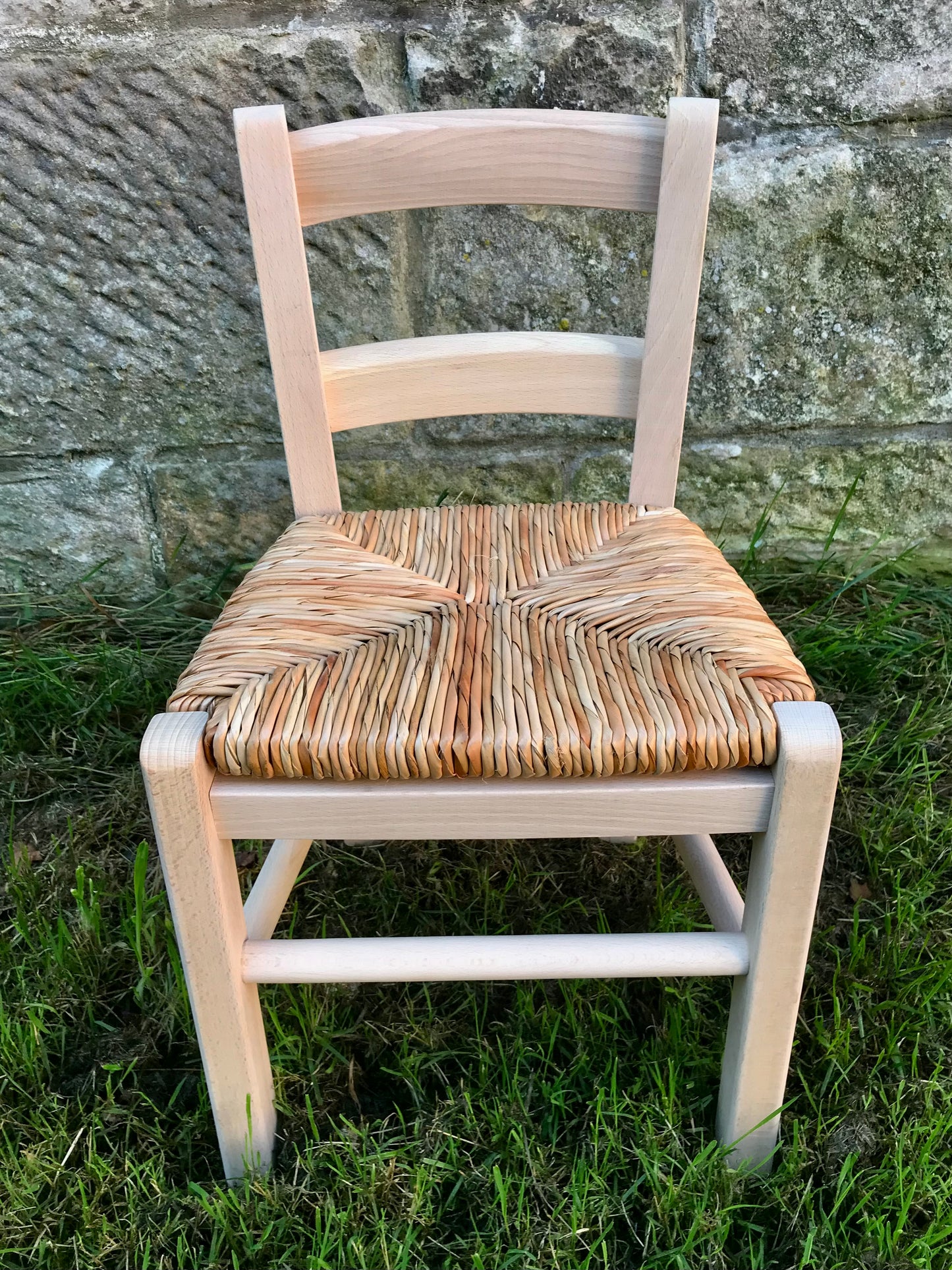 Plain wooden rush seat children's chair available raw to be painted by you or hand painted from the colour chart provided.