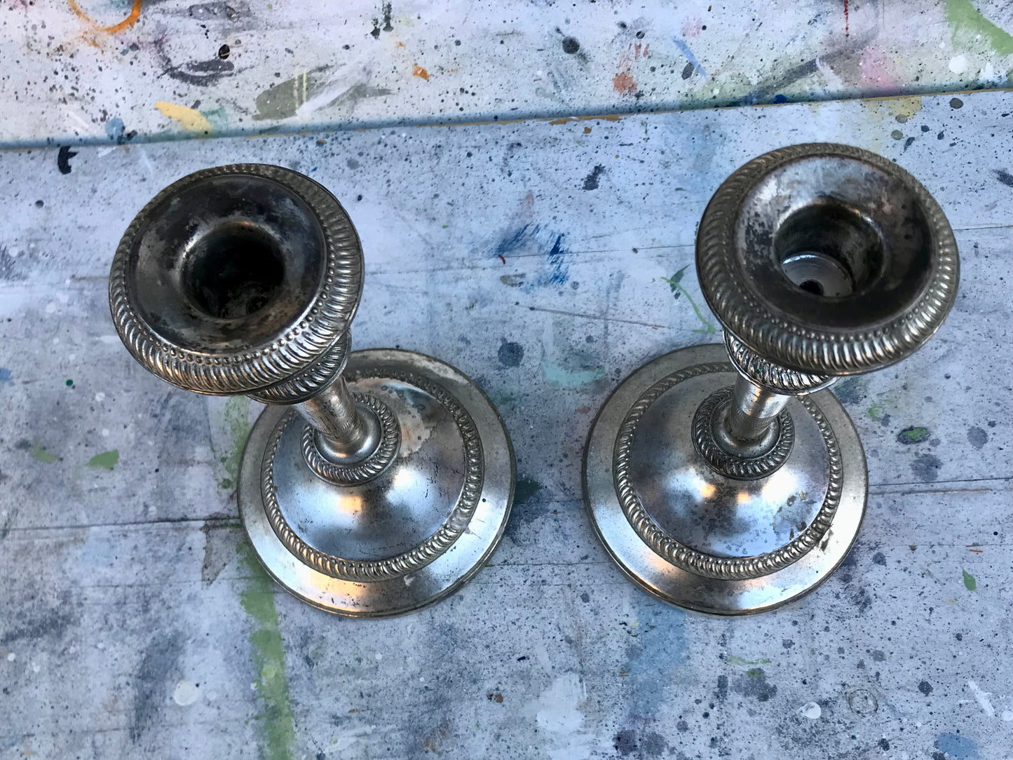 Pair of vintage silver coloured candlesticks