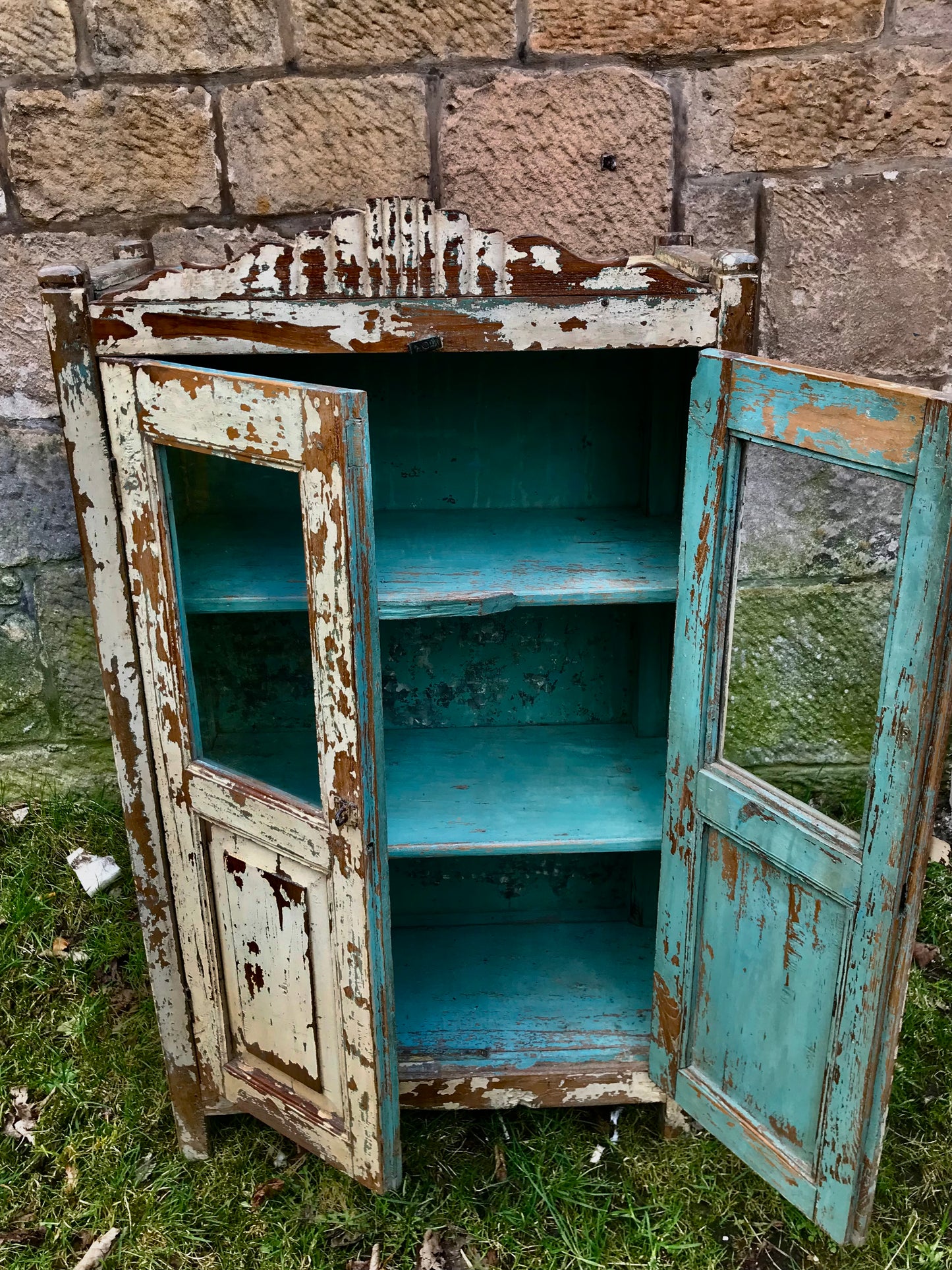 Stunning Antique 1920's teak wood glass fronted cabinet with original chippy cream and blue paint finish