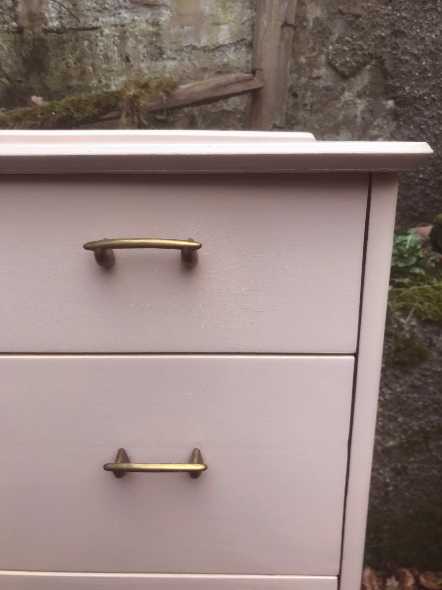 Mid century chest of drawers painted in soft plaster with restored beech legs.