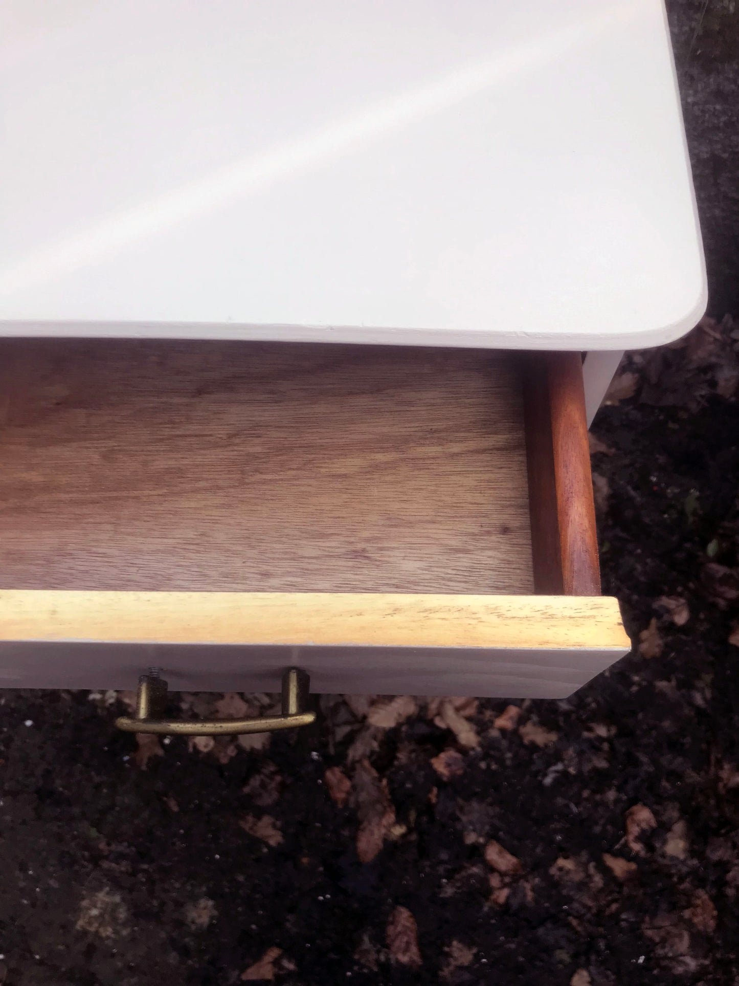Mid century chest of drawers painted in soft plaster with restored beech legs.