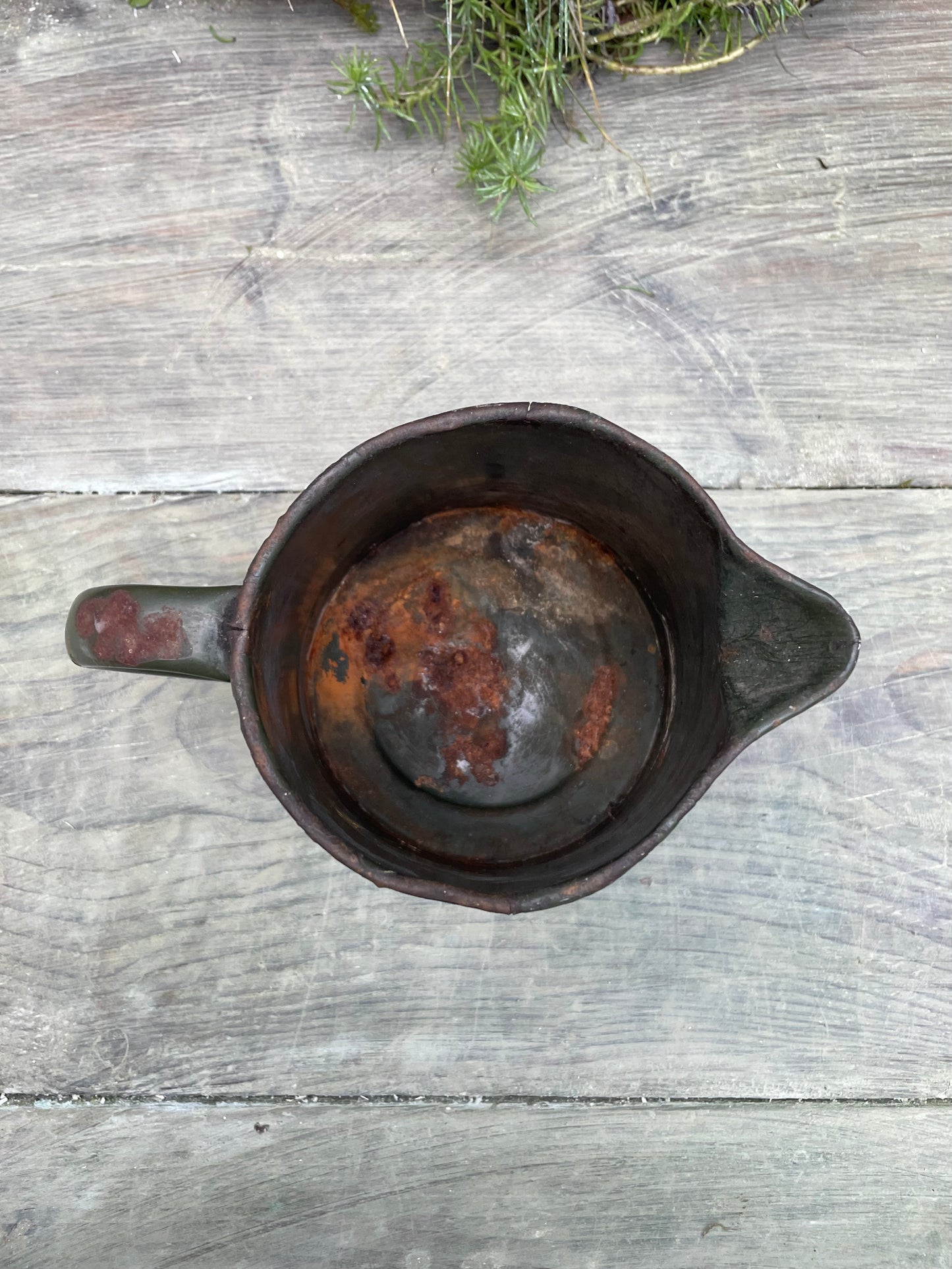 Vintage bottle green enamel jug.