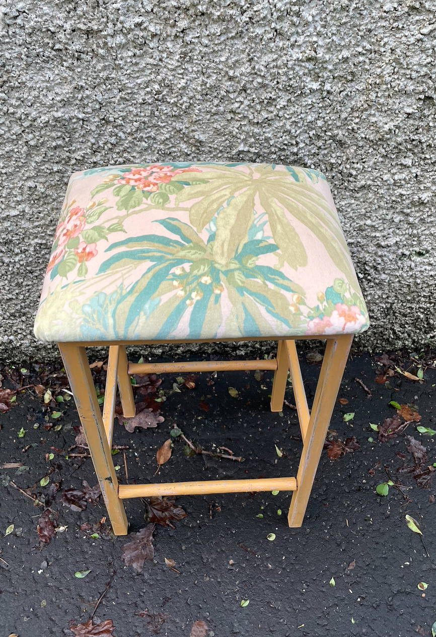 Vintage metal stool with tropical velvet seat pad