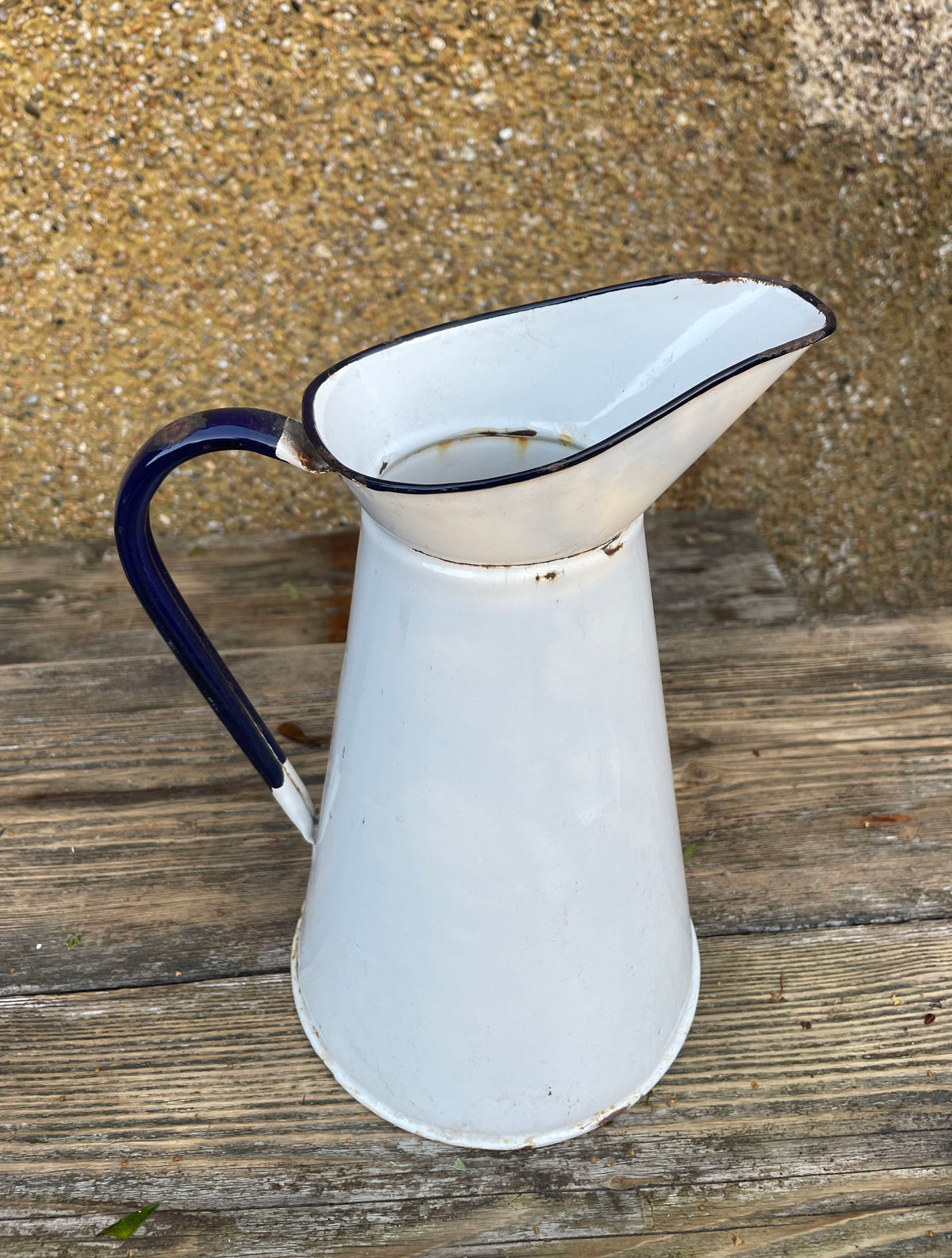 Vintage blue and white enamel jug.
