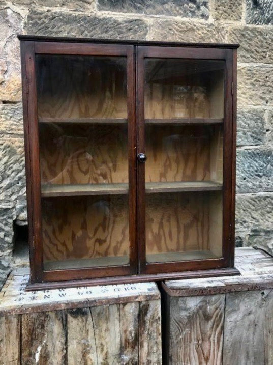 Vintage glass fronted wall cabinet - sold on Etsy