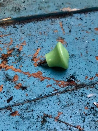 Little vintage plastic furniture handle