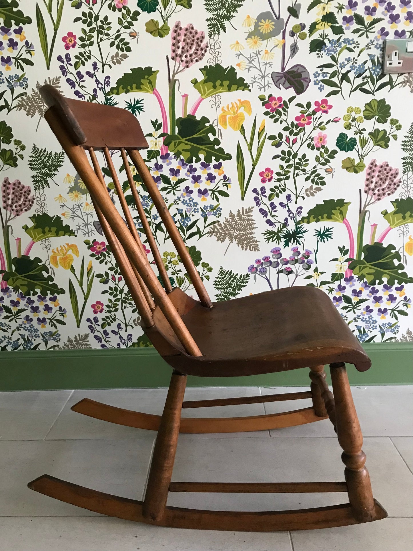 Vintage small wooden rocking chair