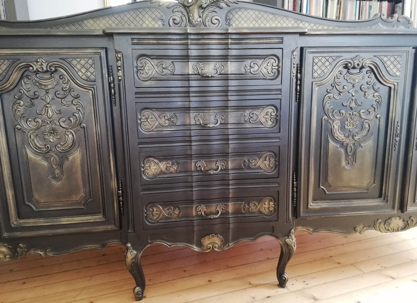 Custom Listing sideboard painted in black with bronze highlights