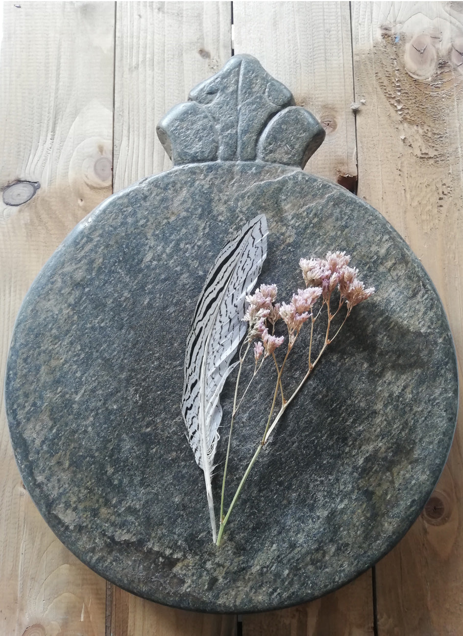 Antique carved stone chapati board. These make prefect trivets, pot stands or cheese boards