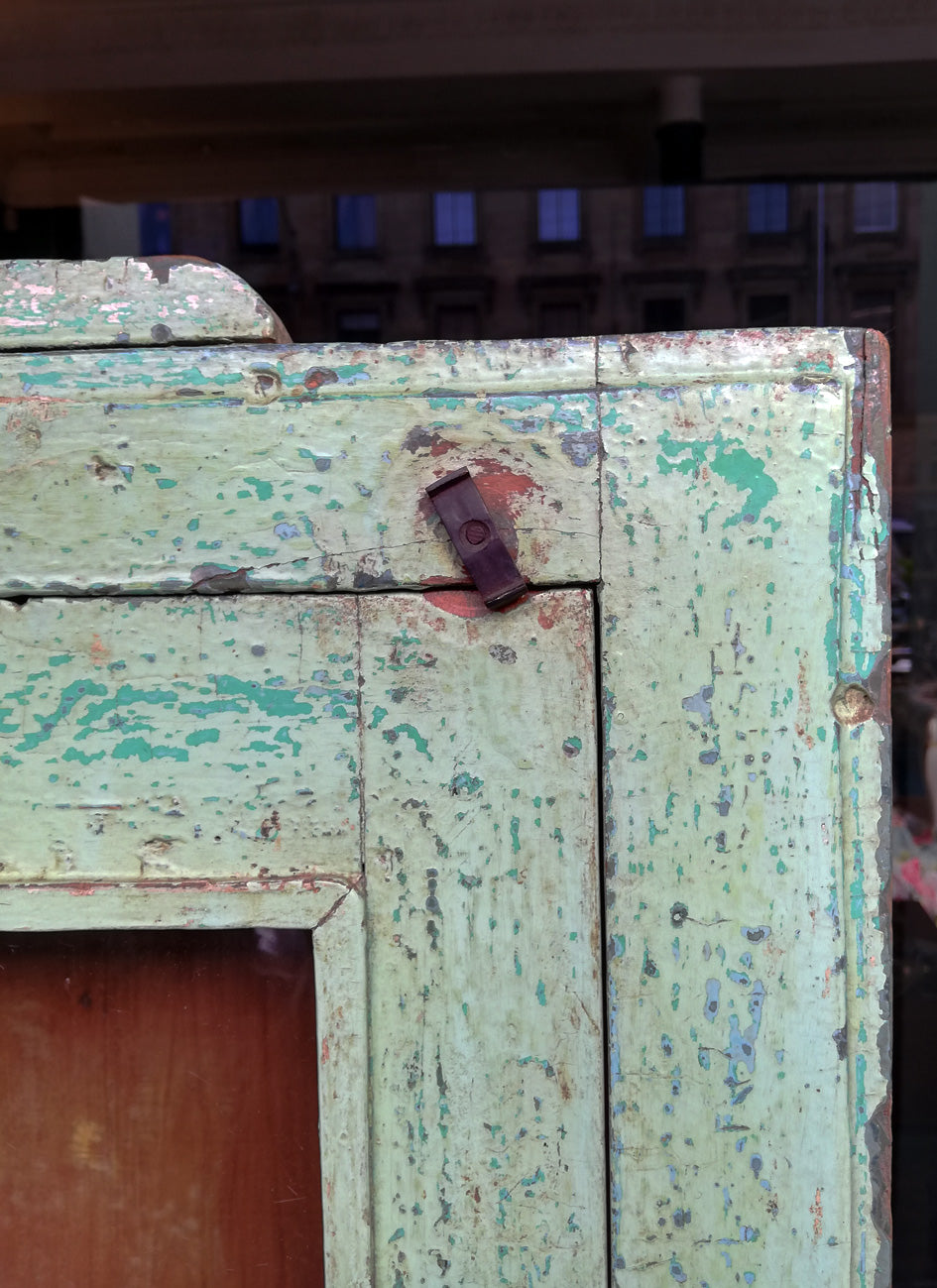 Beautiful Indian antique teak painted glass fronted wall cabinet with original green chippy paint