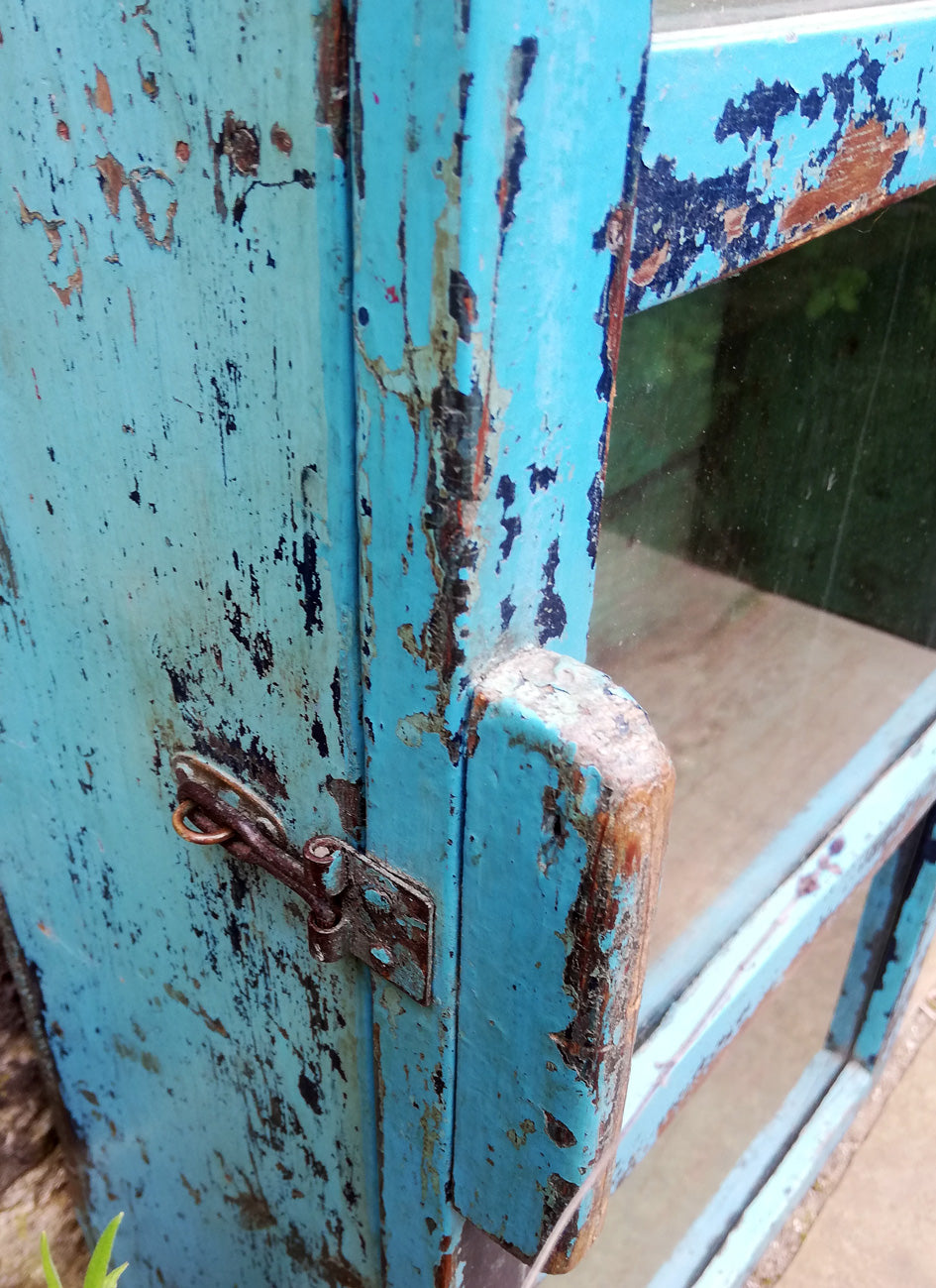 Beautiful antique teak painted glass fronted wall cabinet with original blue chippy paint