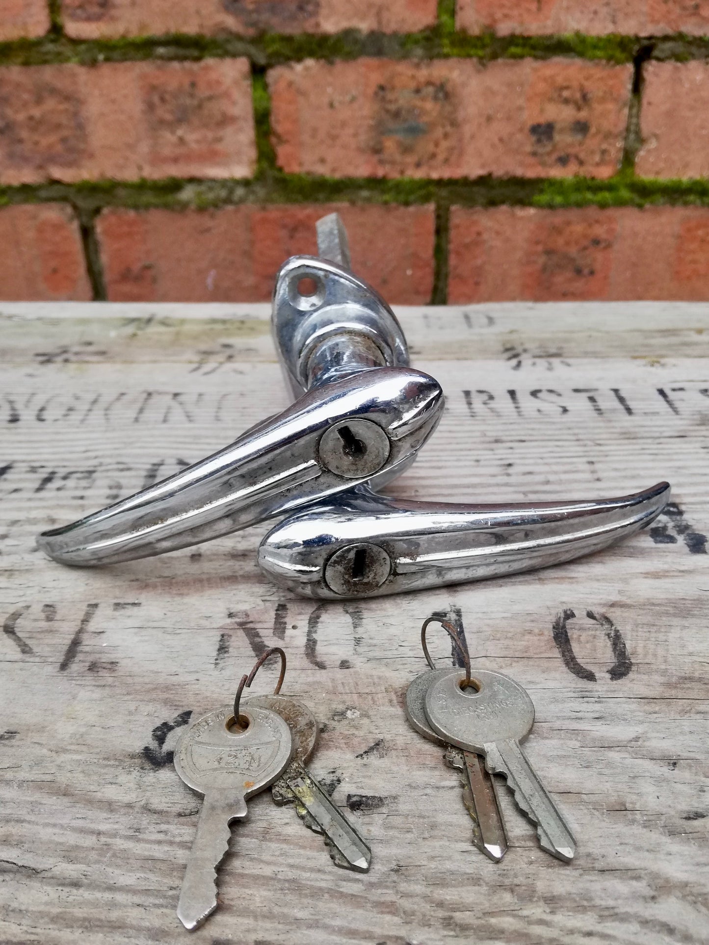 Pair of Vintage chrome door handles with keys