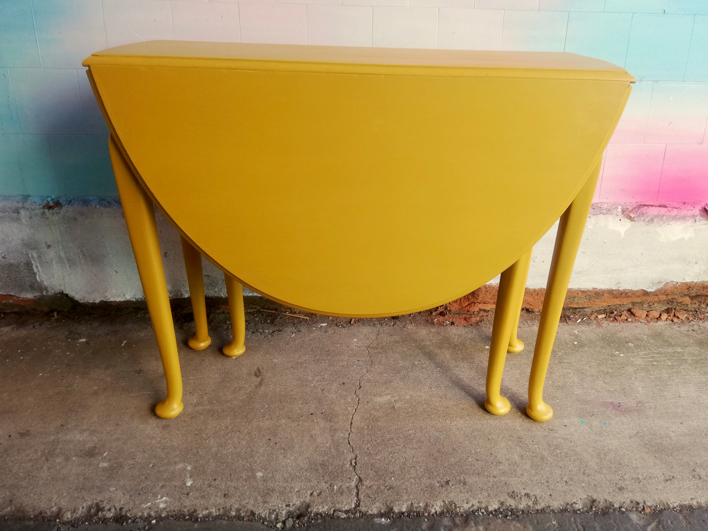 Vintage drop-leaf table in Mustard
