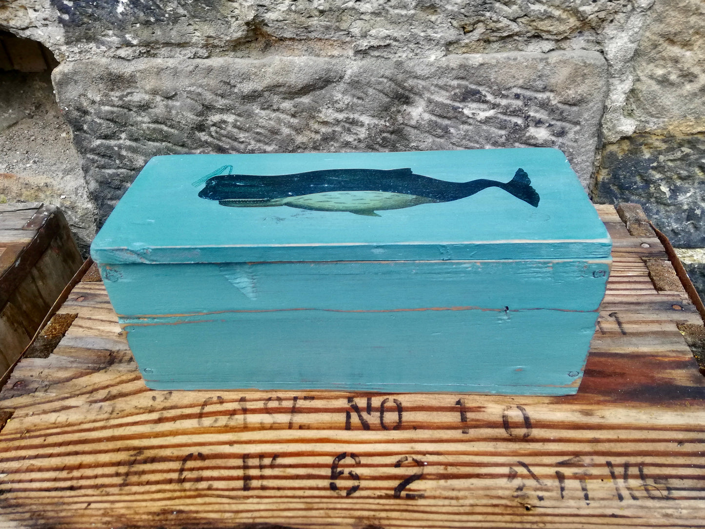 Vintage wooden box with whale design