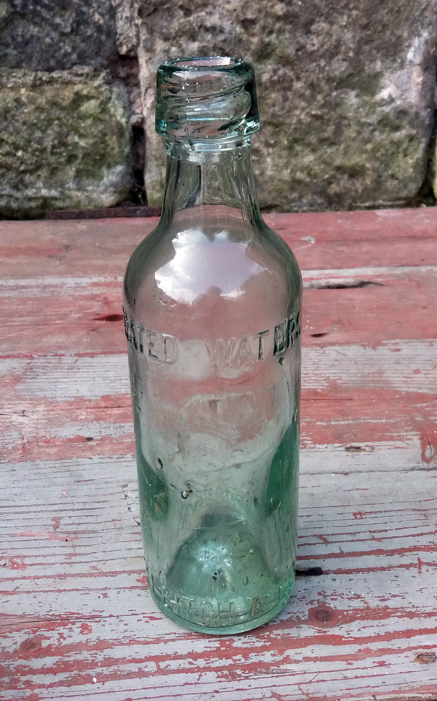 Large vintage glass bottle.