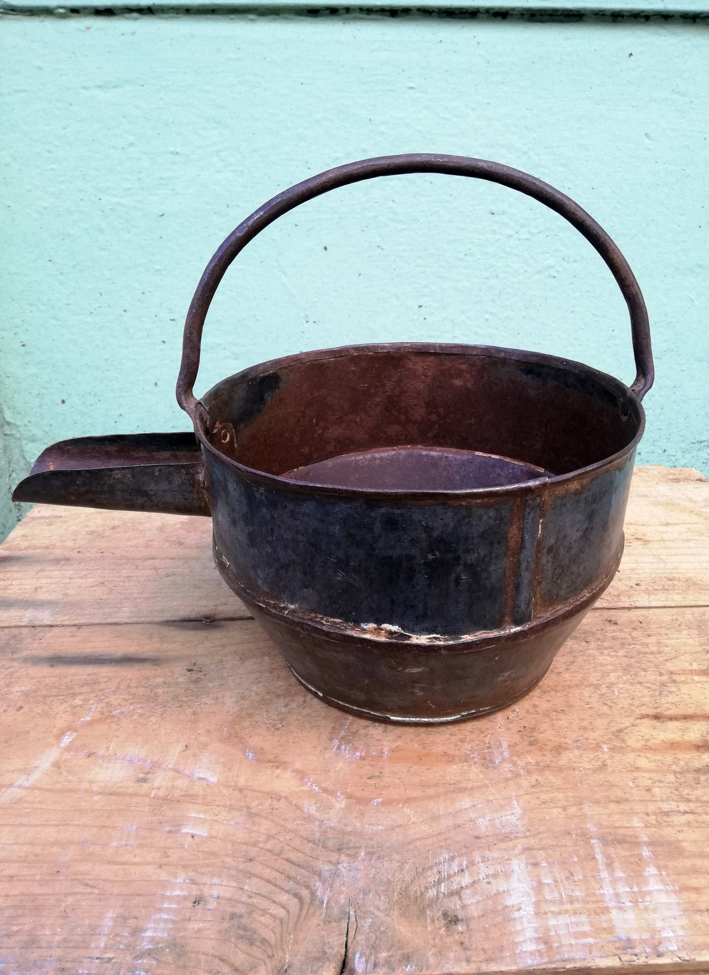 Restored antique iron curd pots.
