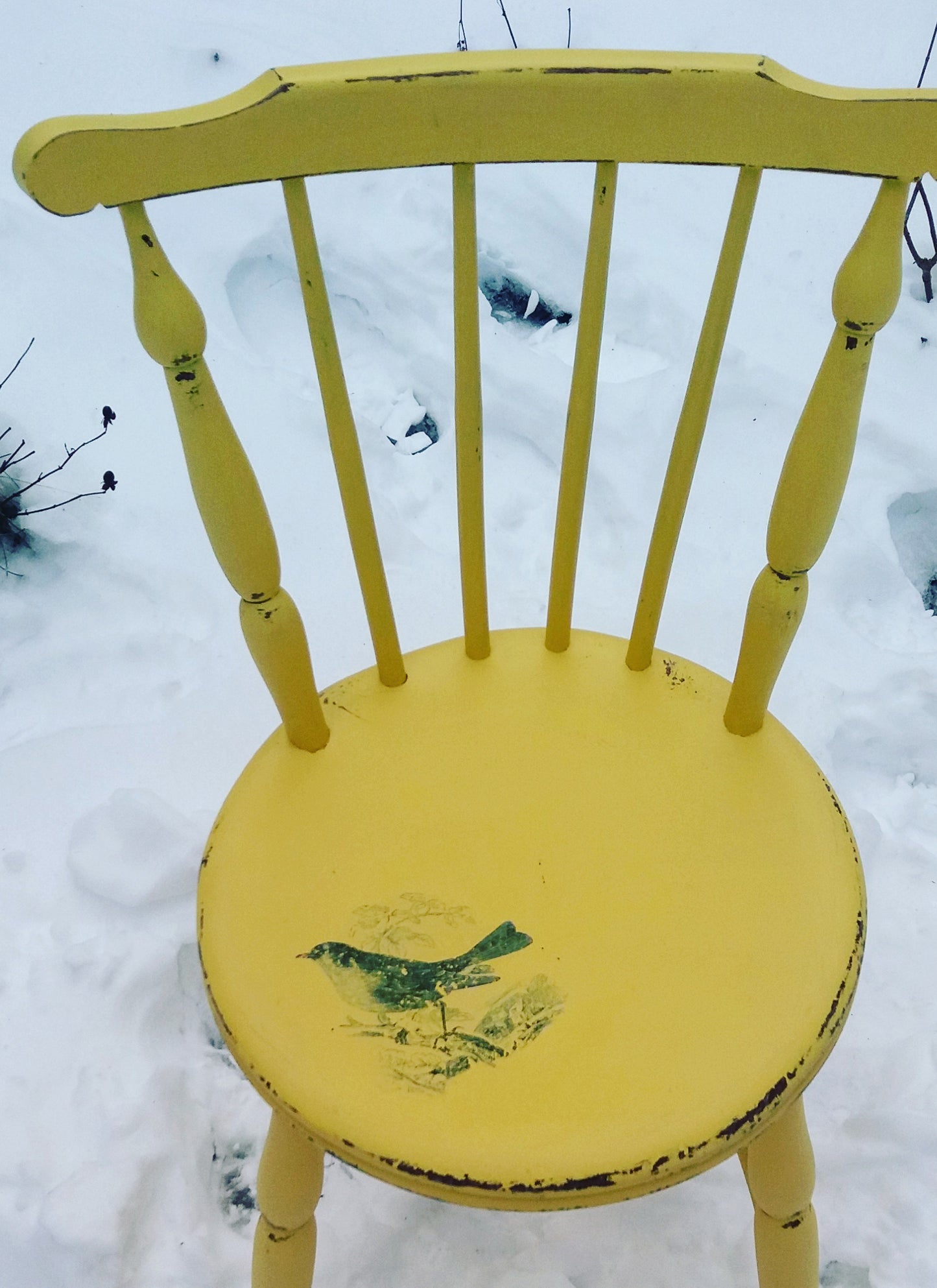 Vintage painted yellow penny chair with retro jade green bird design