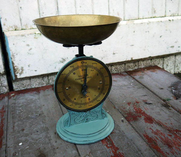 Vintage brass tone weighing scales with the base painted in Miss Mustard Seed Milk Paint and sealed with wax