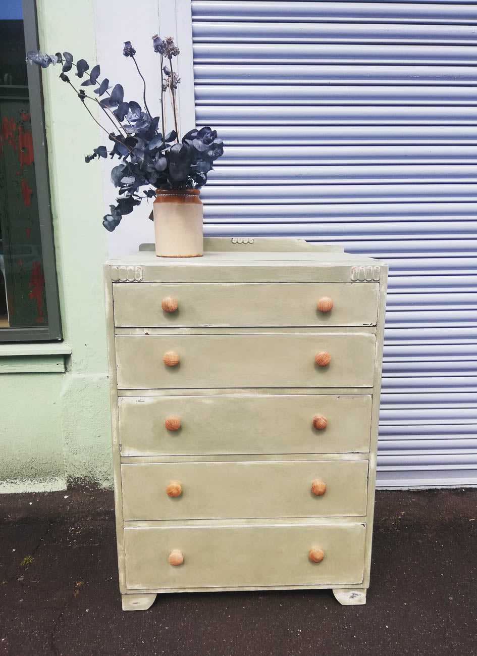 Vintage chest of drawers hand painted in layers of chippy chalk paint in cream and soft green