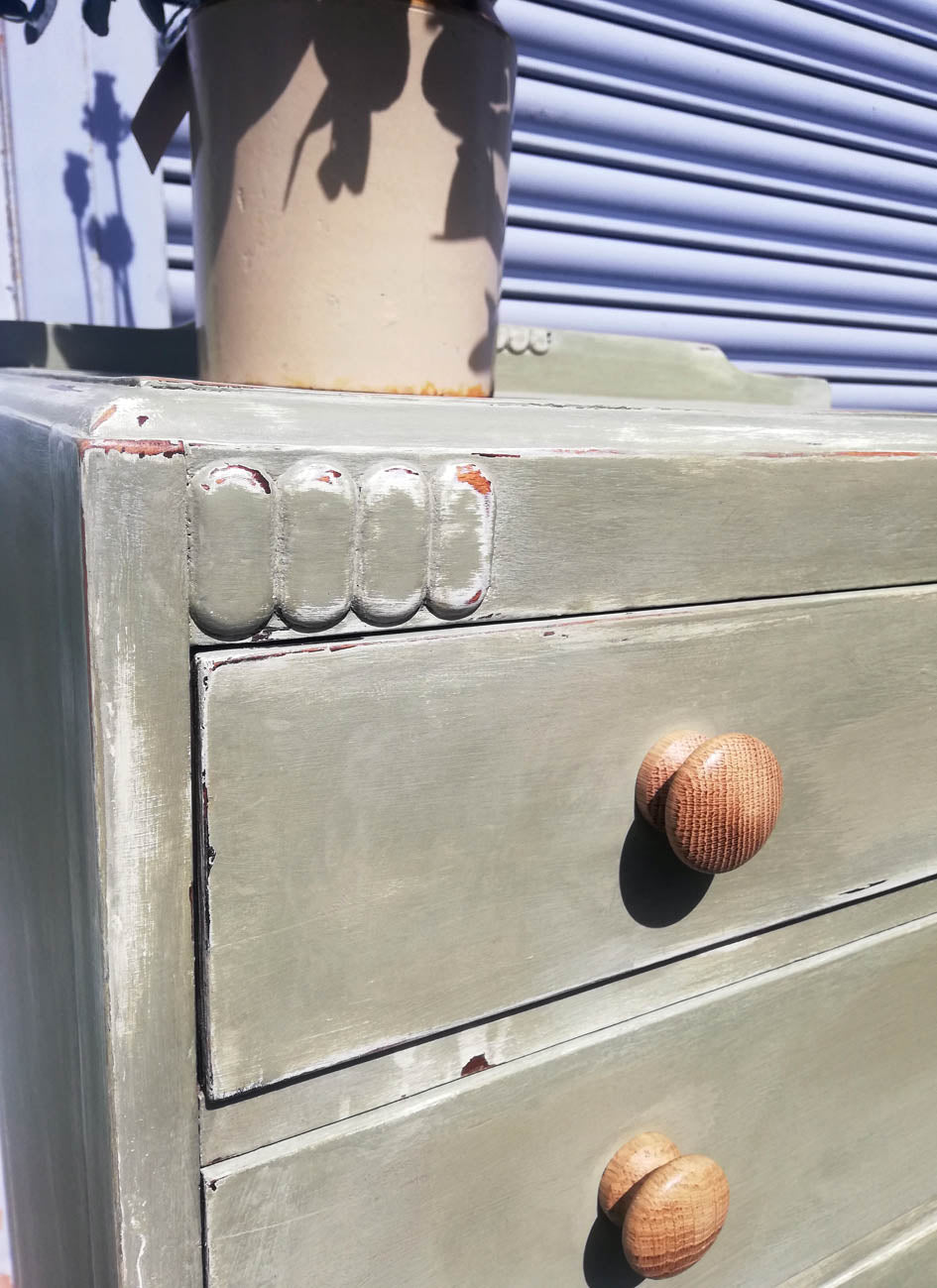 Vintage chest of drawers hand painted in layers of chippy chalk paint in cream and soft green