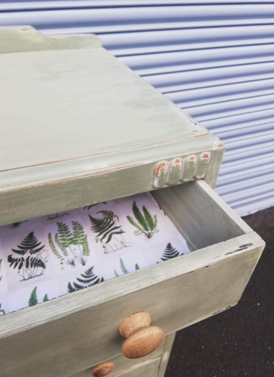Vintage chest of drawers hand painted in layers of chippy chalk paint in cream and soft green