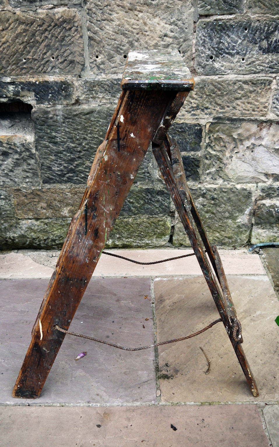Vintage wooden paint splattered step ladder