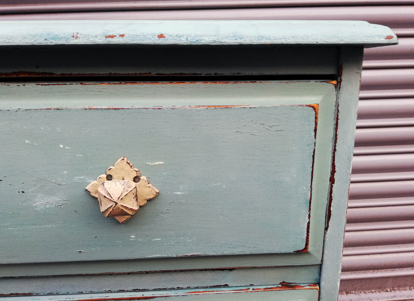Vintage chest of drawers painted in chippy soft blue milk paint