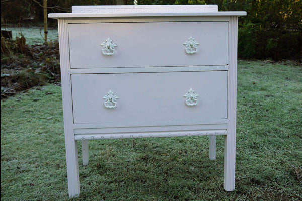 refurbished children's chest of drawers in Ecos Organic Nursery paint powder pink