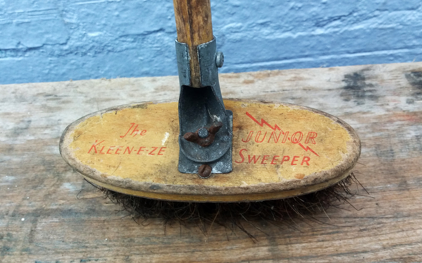 Vintage Kleen-e-ze children's toy sweeping brush.