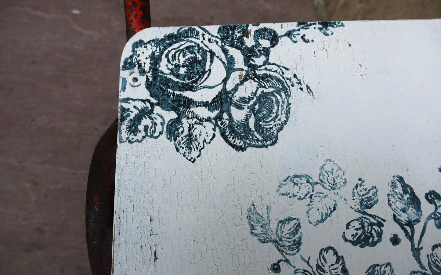 Vintage children's school chair painted in Miss Mustard Seed Milk Paint with blue rose design
