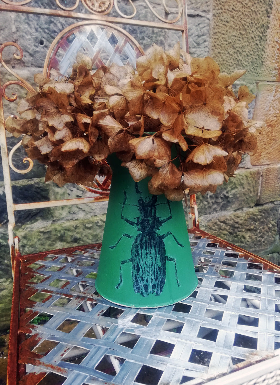 Vintage metal jug reloved using Park Bench Green and a black beetle design
