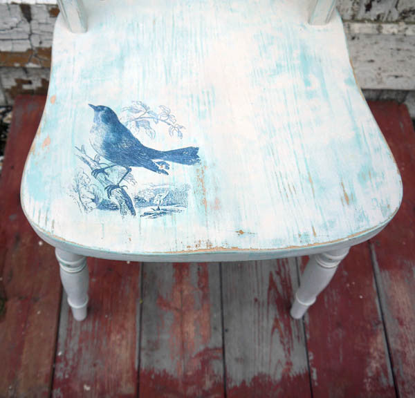 Vintage wheelback chair painted in Miss Mustard Seed Milk Paint in with blue bird toile design