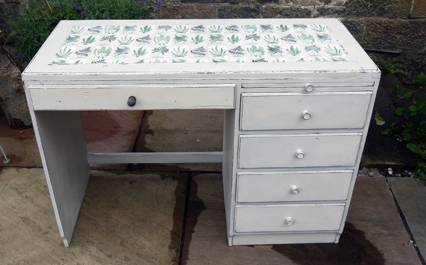 Vintage writing desk painted in chippy miss mustard seed milk paint grain sack grey layered with Bergere and a botanical fern design