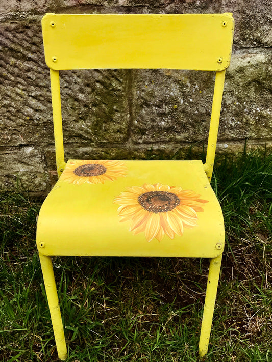 Vintage painted yellow school chair with sunflowers