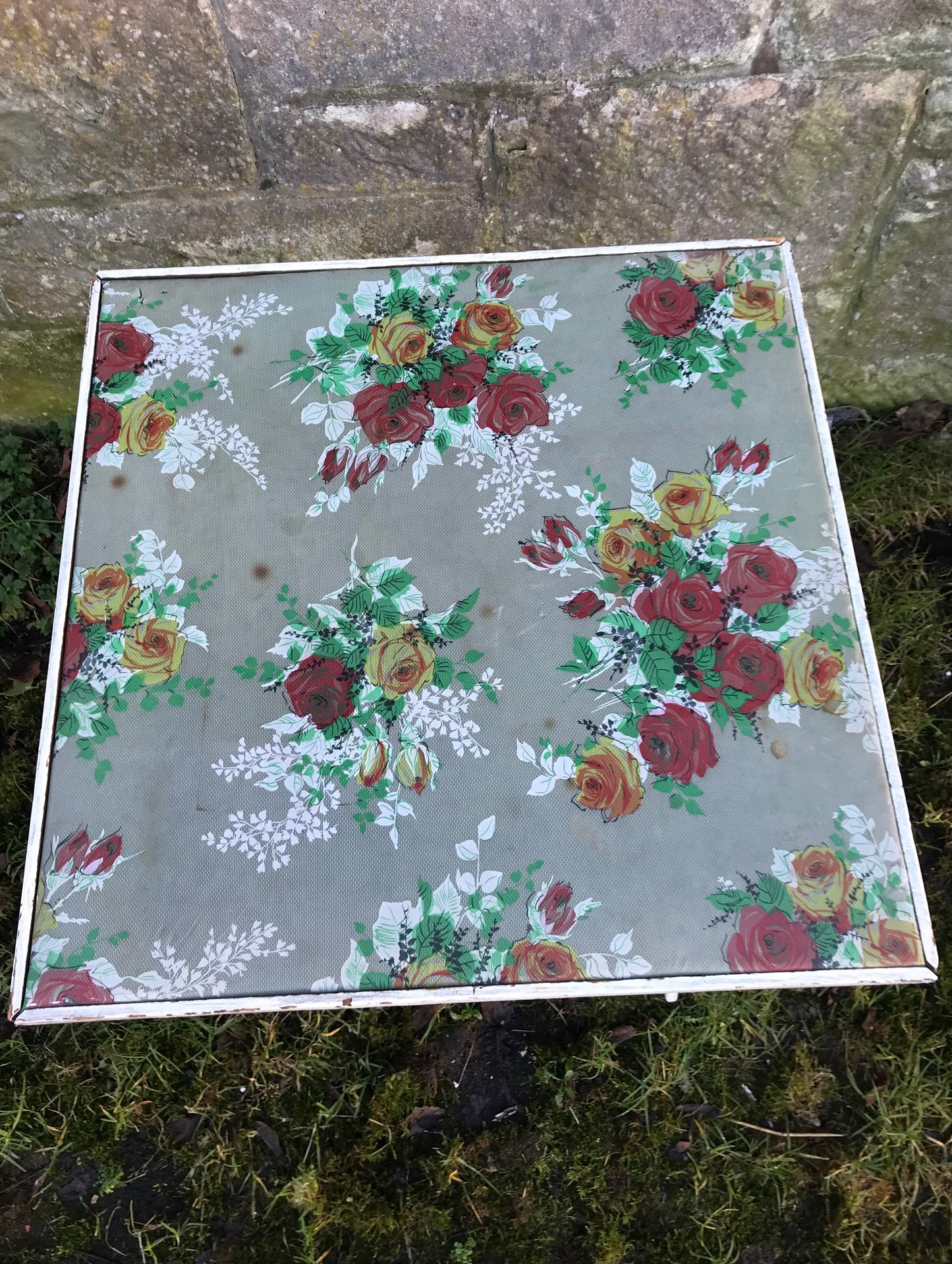Folding 1950's table with floral padded vinyl fabric top