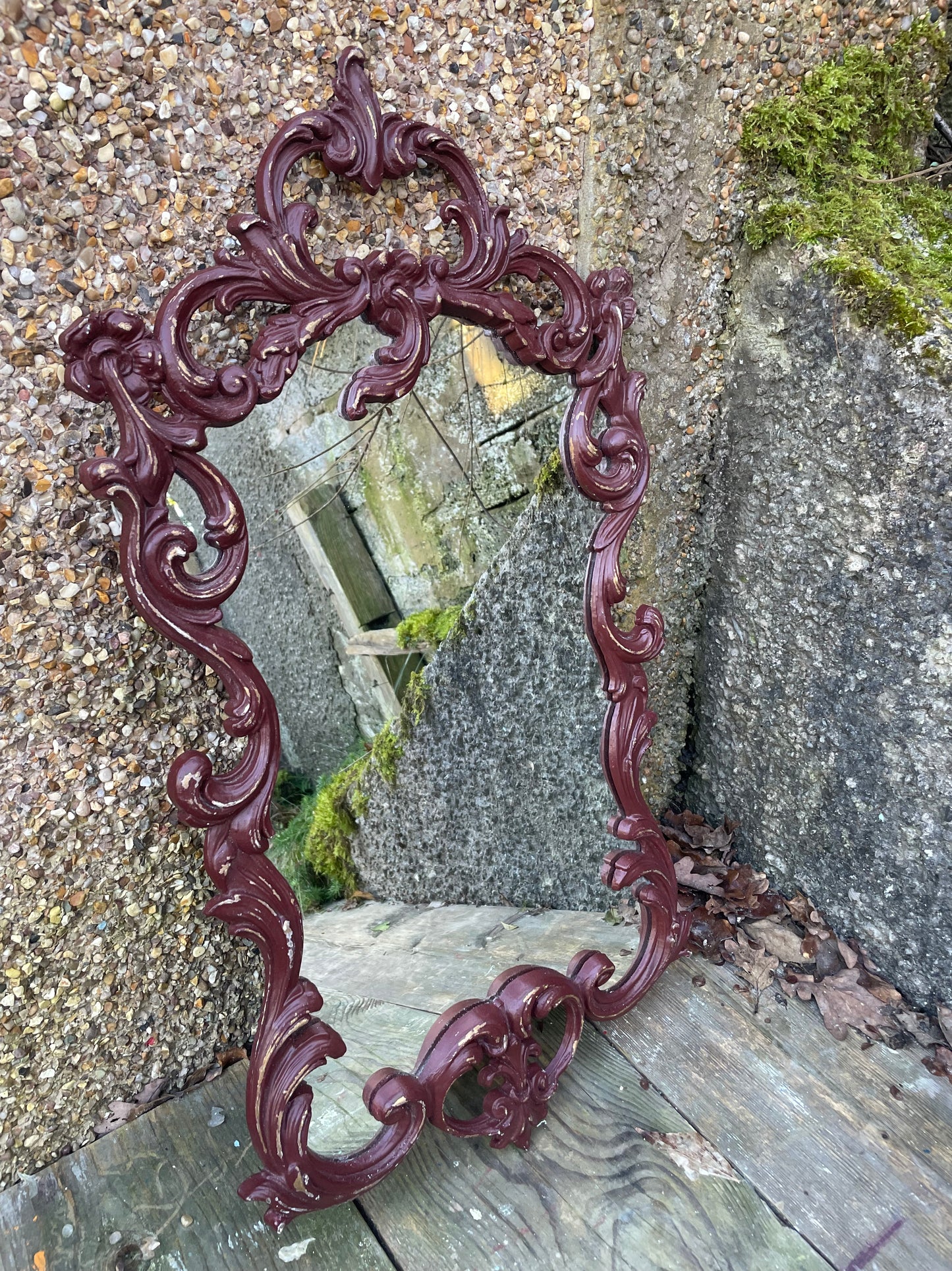 Ornate reproduction vintage plastic moulded  mirror painted in a deep dark burgundy