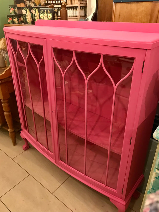 Vintage glass fronted display cabinet/ drinks cabinet painted in hot pink