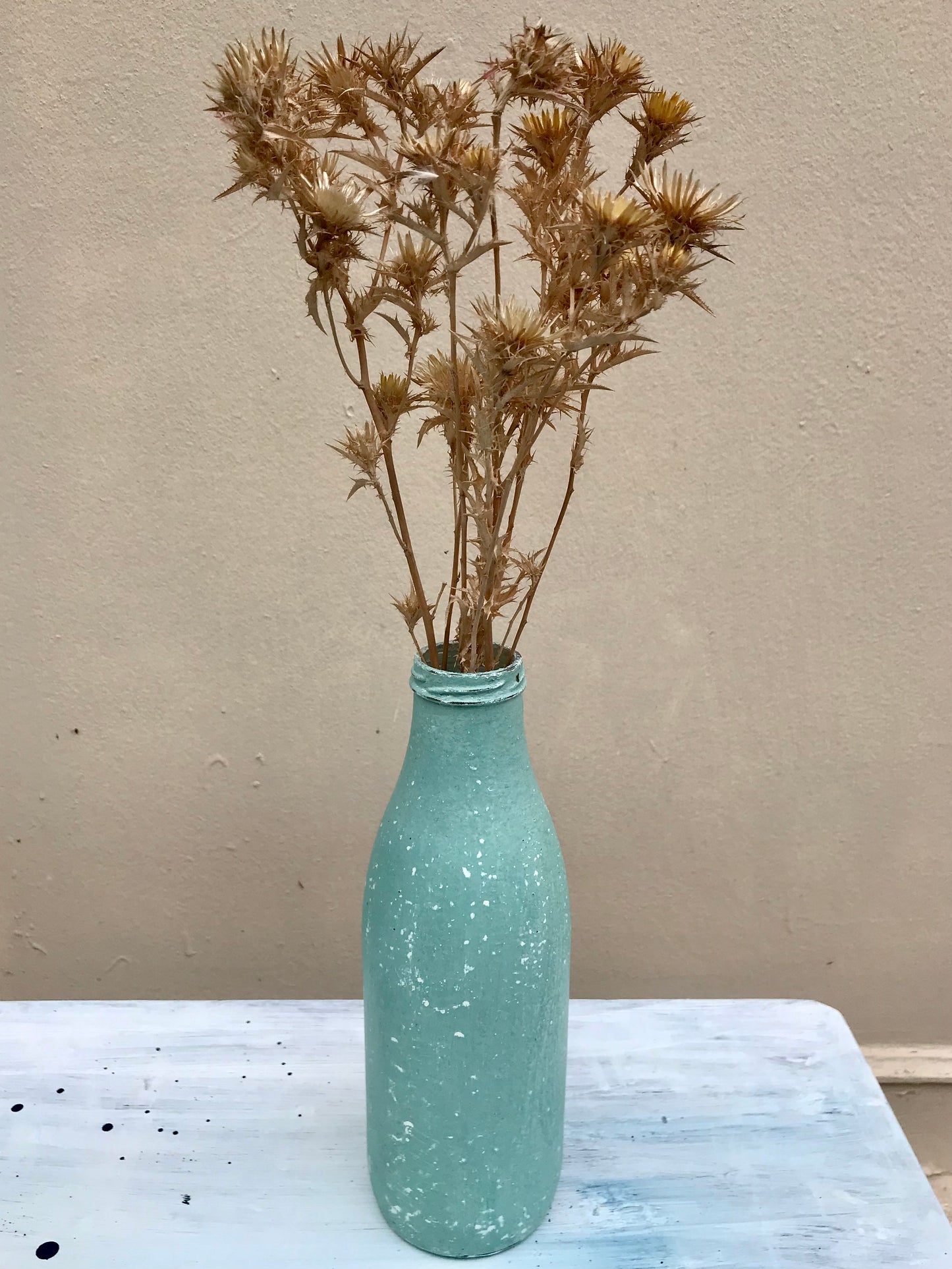 Bottle bud vase painted in layers of textured milk paint