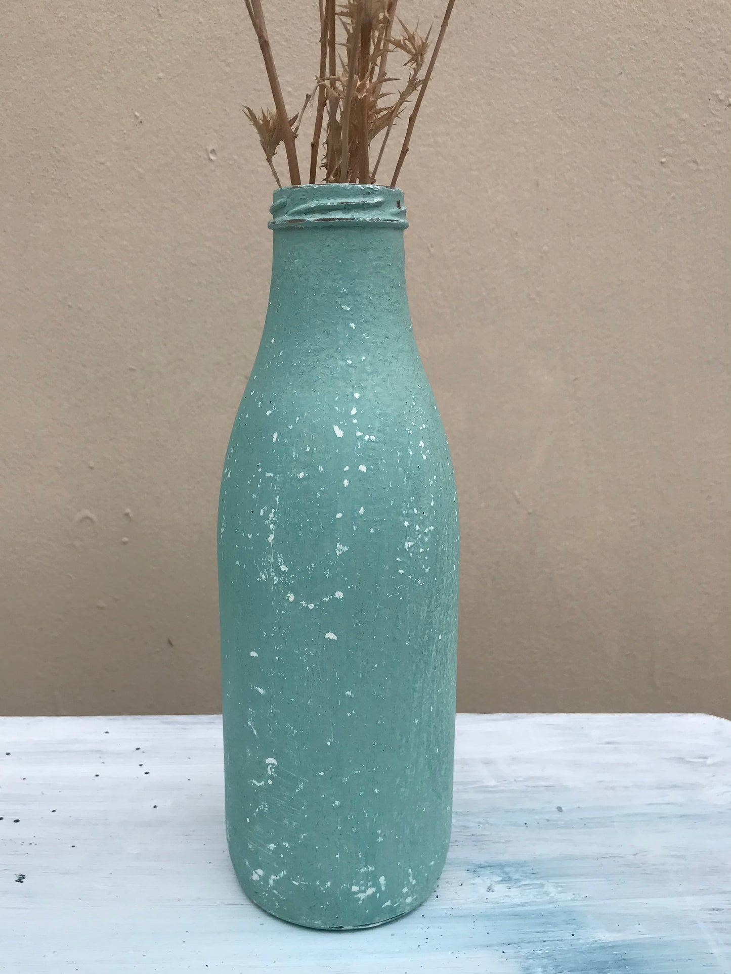 Bottle bud vase painted in layers of textured milk paint