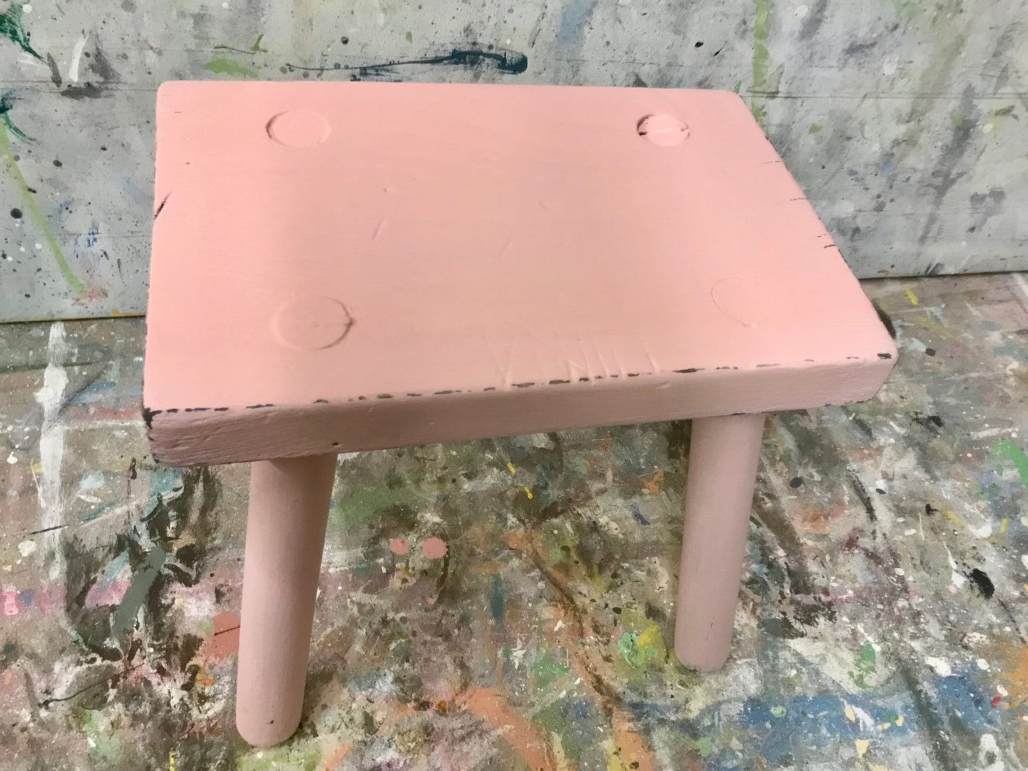 Vintage rustic stool painted in chippy millennial pink milk paint