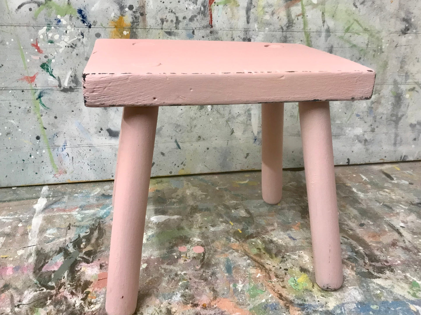 Vintage rustic stool painted in chippy millennial pink milk paint