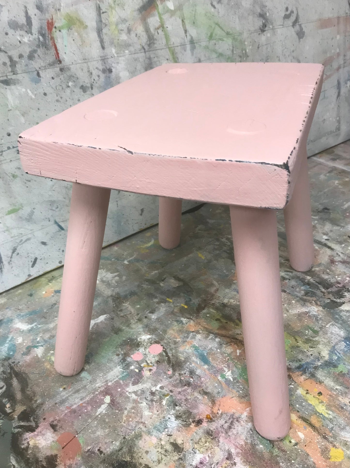 Vintage rustic stool painted in chippy millennial pink milk paint