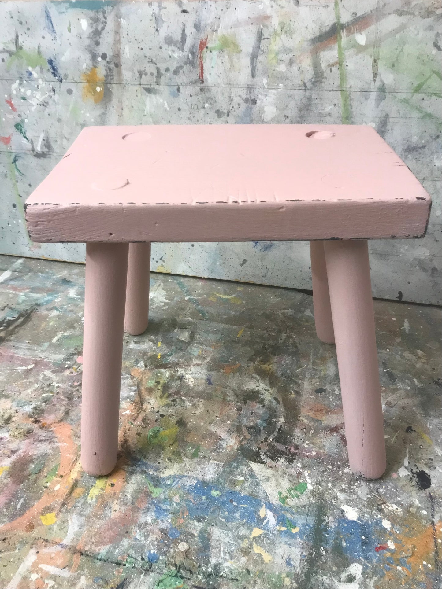 Vintage rustic stool painted in chippy millennial pink milk paint