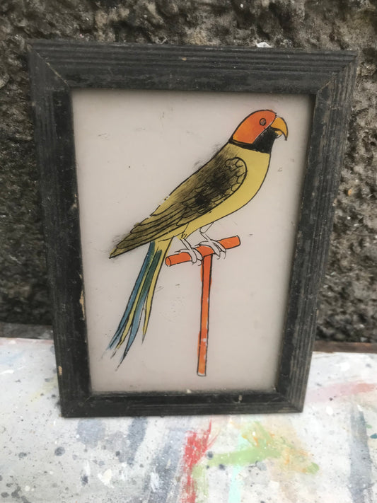 Vintage glass painting of a parrot in a beautiful original frame