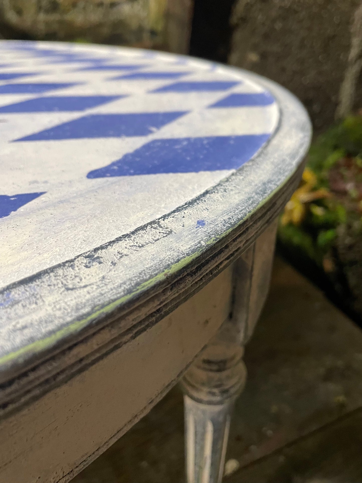 Vintage coffee table painted in a textured patina with french diamond stencil design.
