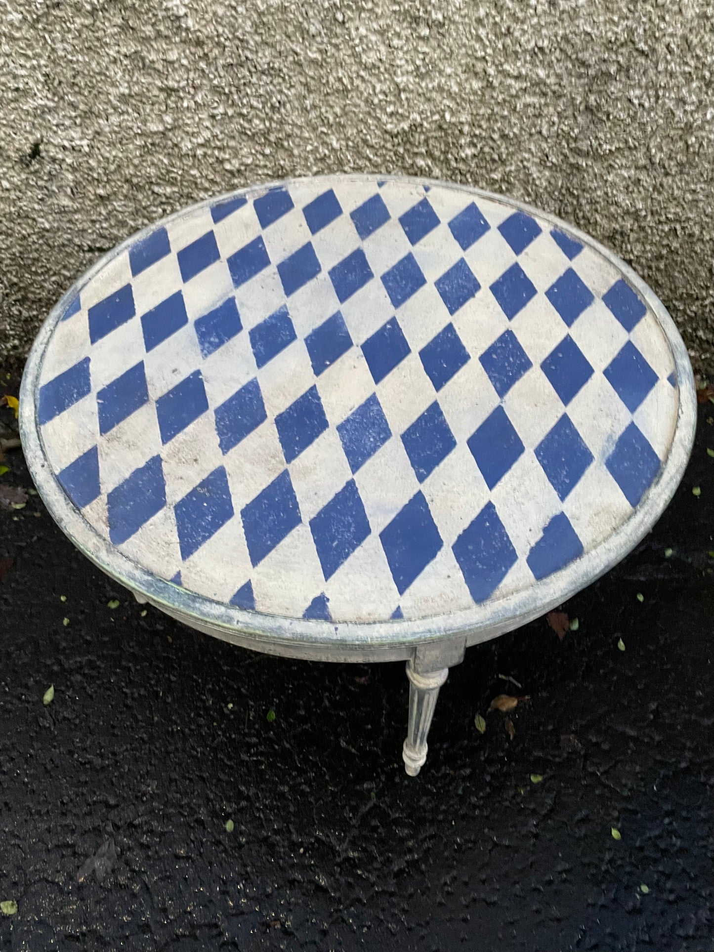 Vintage coffee table painted in a textured patina with french diamond stencil design.