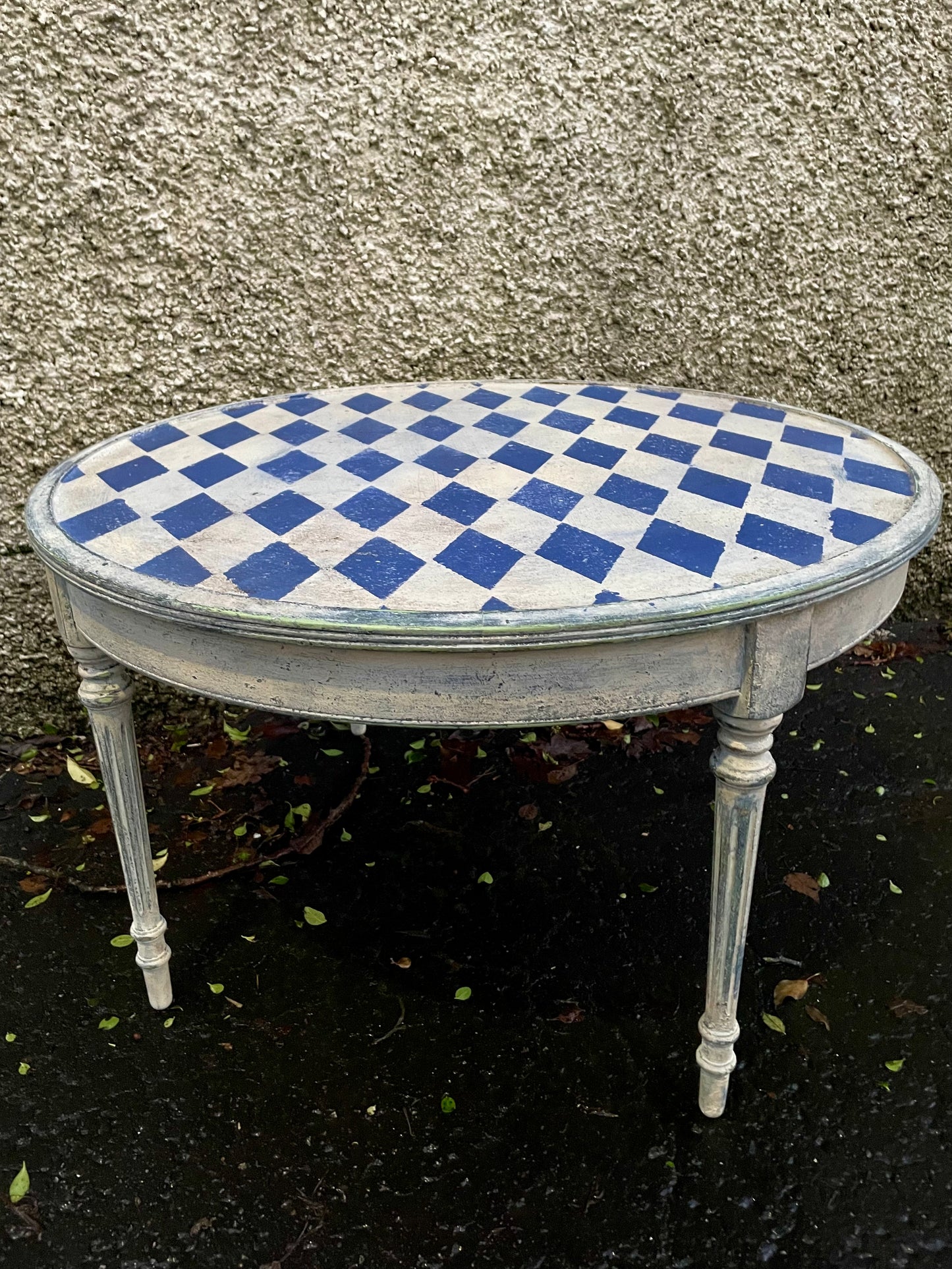 Vintage coffee table painted in a textured patina with french diamond stencil design.