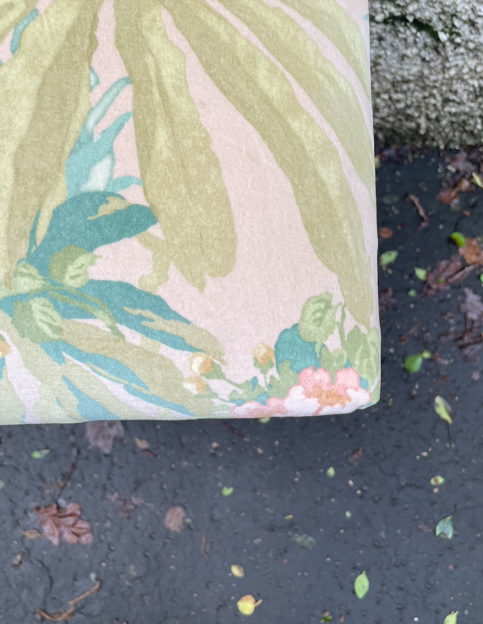 Vintage metal stool with tropical velvet seat pad